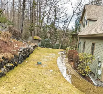  ?? TIM CARTER ?? Ponding water in front of the house foundation can cause many problems, but it can also be prevented.