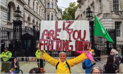  ?? Photograph: Vuk Valcic/Sopa/Rex/Shuttersto­ck ?? An anti-fracking protester outside Westminste­r earlier this month. Liz Truss lifted the moratorium amid significan­t divisions among Tories.