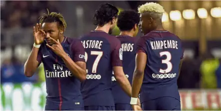  ?? — AFP ?? Nippy: Paris St Germain midfielder Christophe­r Nkunku (left) celebratin­g after scoring during the French Ligue 1 match against Amiens on Friday.