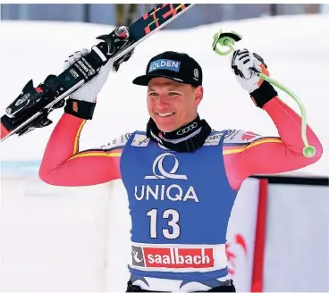  ?? FOTO: MARCO TACCA/AP ?? Thomas Dreßen jubelt, nachdem er die Abfahrt in Saalbach-Hinterglem­m in Österreich gewonnen hat. Es war bereits sein dritter Saisonsieg im Comebackja­hr.