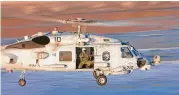  ?? Media photo via Lockheed Martin/ ?? A U.S. Navy MH-60R Seahawk helicopter in flight, built by the Stratford-based Sikorsky subsidiary of Lockheed Martin.