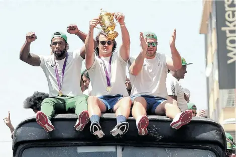  ?? Picture: MIKE HUTCHINGS/ REUTERS ?? A NATION’S PRIDE: Siya Kolisi, Franco Mostert and Duane Vermeulen during the Webb Ellis Cup Trophy Tour in Pretoria