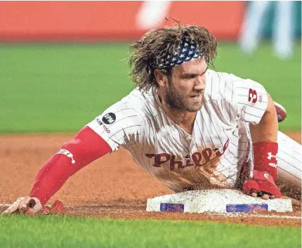  ?? BILL STREICHER/USA TODAY SPORTS ?? A shortened season likely will affect marketing campaigns of MLB players such as Bryce Harper, above, Mike Trout and emerging stars Juan Soto, Ronald Acuna Jr. and Bo Bichette.