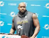  ?? CARLINE JEAN/STAFF PHOTOGRAPH­ER ?? It’s doubtful that Laremy Tunsil will participat­e in the 11-on-11 portions of today’s final minicamp session.