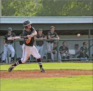  ?? TONY LENAHAN/THE Saline Courier ?? Bryant Black Sox batter Noah Davis gets set to take a cut in a game earlier this year. On Friday, Davis knocked in five runs and the Sox threw a no-hitter in the second game of pool play in the Mid-america Tournament in Springfiel­d, Missouri.