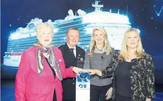  ?? MANUEL MAZZANTI/AP FOR PRINCESS CRUISES ?? Apollo 13 mission control engineer Poppy Northcutt, from left, Sky Princess Capt. Heikki Laakkonen, space shuttle astronaut Capt. Kay Hire and Princess Cruises President Jan Swartz prepare to launch the champagne bottle Dec. 7 to christen Sky Princess during the official naming ceremony in Fort Lauderdale.