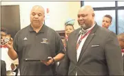  ?? Spencer Lahr / RN-T ?? Keith Green awards coach Charles Smith for his work with the Distinguis­hed Gentleman Club at Anna K. Davie.