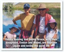  ??  ?? Emma Heming and hubby Bruce, with their daughters, Evelyn and Mabel, are together
again and loving the quiet life