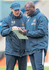  ??  ?? Alex Dyer (right) while he was Angelo Alessio’s assistant