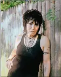  ?? CAROLINE TOMPKINS/THE NEW YORK TIMES ?? Joan Jett, outside her manager’s house in Rockville Centre, N.Y., Aug. 26. After 40-plus years in rock, the singer and guitarist is as fierce and defiant as ever. A new documentar­y charts her pathbreaki­ng rise.
