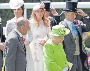  ?? Picture: PA. ?? Prince Philip, the Queen and Ascot chairman Johnny Weatherby observe a minute’s silence to mark the recent tragedies.