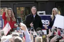  ?? JOHN BAZEMORE - THE ASSOCIATED PRESS ?? Sen. Kelly Loeffler, R-Ga., left, stands with Sen. David Perdue, R-Ga., and Ivanka Trump, Assistant to the President, during a campaign rally, Monday, Dec. 21, n Milton, Ga.