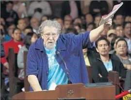  ?? Mel Melcon Los Angeles Times ?? ANDY GRIGGS, who rents out a room in his Echo Park home, speaks against the proposed short-term rental ordinance at a City Council meeting Wednesday.