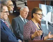  ?? J. Scott Applewhite Associated Press ?? REP. KAREN BASS, right, chairs the Congressio­nal Black Caucus and in 2008 became the first Black woman to lead a U.S. state legislativ­e house.