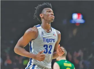  ?? AP PHOTO/CRAIG MITCHELLDY­ER ?? Memphis center James Wiseman runs off the court during the second half of the Tigers’ game against Oregon on Tuesday in Portland.