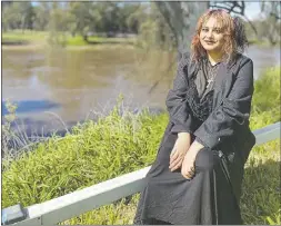  ?? PHOTO: DUBBO PHOTO NEWS. ?? Voices of Women local artist Kalina Davis on the riverbank of the Macquarie River to gain inspiratio­n for her song writing and story telling.