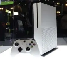  ?? KEVORK DJANSEZIAN/GETTY IMAGES FILE PHOTO ?? The new Xbox One S console will be released on Aug. 2 for $499.