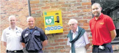  ??  ?? ●● Station manager Tony McCourt pictured with first responder Andy Powell, crew manager Ash Brown and Cheshire Fire Authority member coun Dennis Mahon