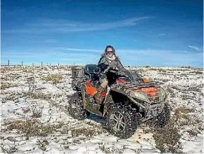  ??  ?? Chloe Phillips-Harris patrolling with her dog Bagera after a snowstorm in Kazakhstan.