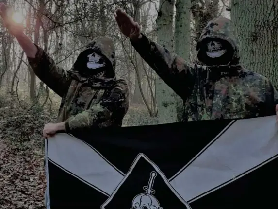  ?? (Eugene Antifa) ?? Two UK members of Feuerkrieg Division in a post online