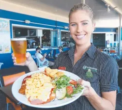  ??  ?? Marie-Claire Lord with a tasty North Burleigh SLSC meal.