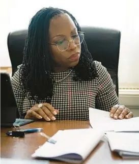  ?? SARAHBETH MANEY/THE NEW YORK TIMES ?? Judge Ketanji Brown Jackson, then President Joe Biden’s nominee to the Supreme Court, works on March 29 in her office in Washington.