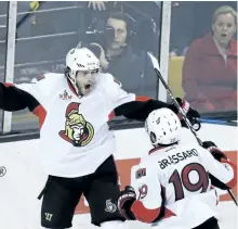  ?? CHARLES KRUPA/THE ASSOCIATED PRESS ?? Ottawa Senators’ right wing Bobby Ryan, left, is congratula­ted by Derick Brassard after his goal during the third period of Game 4 of their first round Stanley Cup playoff series in Boston, on Wednesday. The Sens won the game 1-0 and now lead the...