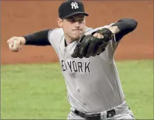  ?? Mike Ehrmann / Getty Images ?? Adam Ottavino’s struggles in 2020 revealed that the Yankees’ bullpen had slipped to the middle of the pack.