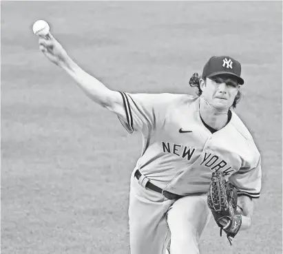  ?? GEOFF BURKE/USA TODAY SPORTS ?? Yankees starter Gerrit Cole earned the victory against the Nationals in the first game of MLB’s 2020 opening day at Nationals Park.