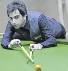  ?? KESHAV SINGH/HT ?? Pankaj Advani plays a shot during the ONGC 16th Asian Billiards championsh­ip being played in Chandigarh on Sunday.