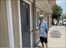  ?? MELANIE GILBERT — LOWELL SUN ?? Kenny, of Lowell, who has been sleeping rough outside at South Common Park, enters Lowell Transition­al Living Center on Middlesex Street in search of a bed for the night after the city cleared the park of unhoused residents on July 19, 2023.