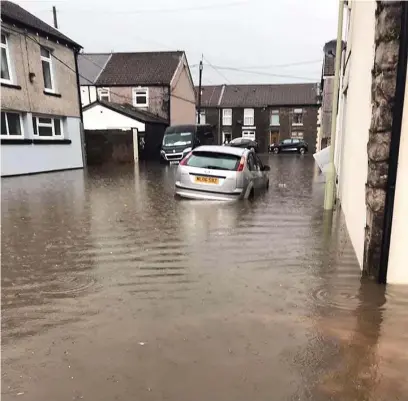  ?? WALES NEWS SERVICE ?? Pentre, near Treorchy, was flooded after Storm Dennis last year