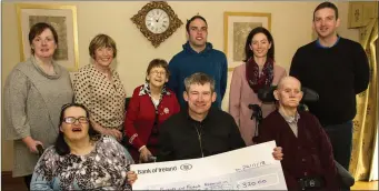  ?? Photo by John Reidy ?? Members of the re-branded Castleisla­nd District Macra Club presenting the proceeds of their coffee morning to clients and management of Glebe House on Saturday morning. Seated: Kathleen O’Callaghan, club treasurer Maurice Roche and Pat Dee. Back row: Centre Manager Joanne Leahy, Theresa Walsh, Eileen Hannon, Chairman Gearóid O’Shea; Secretary Christine Buckley, and Club PRO Alan O’Connor.