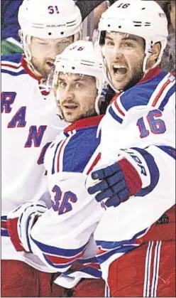  ?? PHOTO BY GETTY ?? Mats Zuccarello (c.) sparks celebratio­n with Rick Nash (l.) and Derick Brassard as winger breaks out of scoring slump to help Rangers begin road trip on right note in Vancouver.