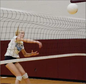  ?? Graham Thomas/Siloam Sunday ?? Siloam Springs outside hitter Clara Butler goes up for a hit Thursday evening during volleyball practice inside the Panther Activity Center.