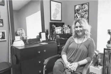 ?? Staff photo by Hunt Mercier ?? ■ Patty Lynn, owner of Beekman Place Salon, poses for a portrait Friday at her station in the salon in Texarkana, Texas. The business is located at 4064 Summerhill Square.