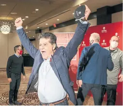  ?? CARLOS OSORIO THE CANADIAN PRESS ?? Unifor president Jerry Dias celebrates a new tentative agreement with GM on behalf of 1,700 members who work in St. Catharines, Oshawa and Woodstock in advance of the strike deadline on Thursday.