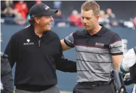  ?? MATT DUNHAM ASSOCIATED PRESS ?? Phil Mickelson et Henrik Stenson ont multiplié les coups spectacula­ires l’an dernier à l’Omnium britanniqu­e. Une telle ronde ne risque pas d’arriver à Erin Hills.