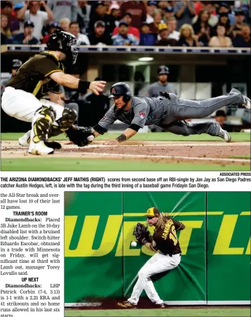  ?? ASSOCIATED PRESS ?? THE ARIZONA DIAMONDBAC­KS’ JEFF MATHIS (RIGHT) scores from second base off an RBI-single by Jon Jay as San Diego Padres catcher Austin Hedges, left, is late with the tag during the third inning of a baseball game Fridayin San Diego.