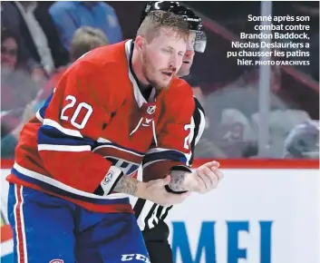  ?? PHOTO D’ARCHIVES ?? Sonné après son combat contre Brandon Baddock, Nicolas Deslaurier­s a pu chausser les patins hier.