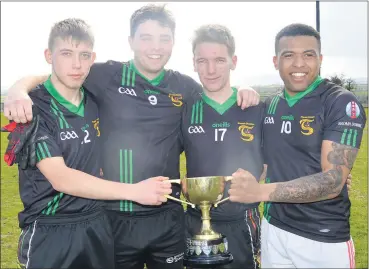  ?? (Pic: P O’Dwyer) ?? Members of St Dominic’s panel with the trophy after winning the O’Sullivan Lewis North Cork U21 Football final last Thursday - Billy O’Grady, Jake Buckley, Jordan O’Grady and Noah Butler.