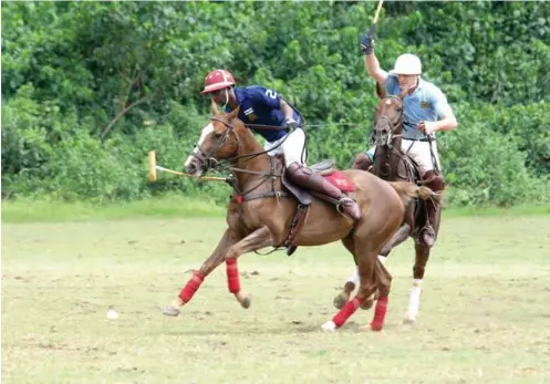  ??  ?? Sayyu Dantata dribbles past his opponent at a recent Easter polo tournament in Abraka, Delta State. The Abraka Turf & Country Club ground is revered as one of the best polo turfs in the country. Bauchi, Minna and other polo grounds are under the radar...