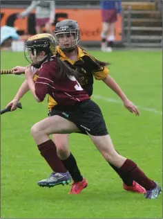  ??  ?? Abbie Walsh of Kilrush tackles Caoimhe Jordan (Bunclody).