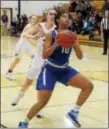  ?? GREGG SLABODA — TRENTONIAN FILE PHOTO ?? Ewing’s Mya Grimes had 22 points in the team’s win over Atlantic City on Sunday. Jaycee Lowe added a clutch 14.