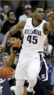  ?? MATT SLOCUM — THE ASSOCIATED PRESS ?? Villanova’s Darryl Reynolds gestures after scoring during the second half Tuesday against Xavier.