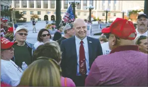  ?? (File Photo/AP/Julio Cortez) ?? Pennsylvan­ia state Sen. Doug Mastriano, R-Franklin (center), speaks Nov. 7 to supporters of President Donald Trump as they demonstrat­e outside the Pennsylvan­ia State Capitol, in Harrisburg, Pa.