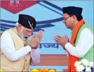  ?? ANI ?? Prime Minister Narendra Modi attends the oath-taking ceremony of Pushkar Singh Dhami as Chief Minister of Uttarakhan­d, in Dehradun on 23 March.