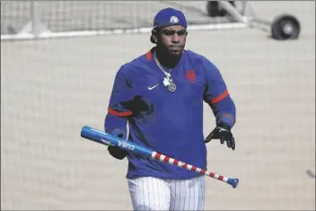  ?? ASSOCIATED PRESS ?? NEW YORK METS LEFT FIELDER Yoenis Cespedes participat­es in a baseball workout at Citi Field, Sunday, in New York.