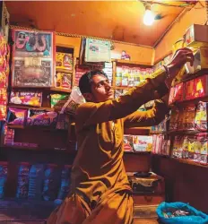  ?? Bloomberg ?? ■ A roadside stall in the Matiari district of Sindh province, Pakistan. Urban core inflation remained broadly stable at 6.9 per cent in July 2021.