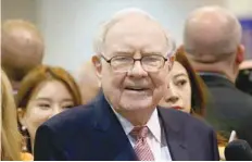  ?? — Reuters ?? Berkshire Hathaway CEO Warren Buffett visits the BNSF booth before the Berkshire Hathaway annual meeting in Omaha, Nebraska, US.